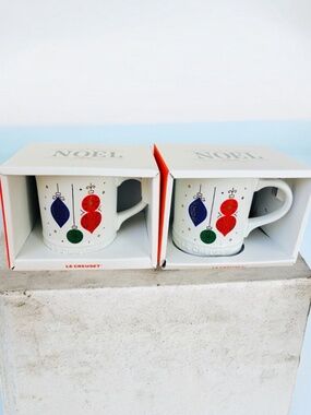 Two Le Creuset Noel Collection Christmas Ornament Mugs